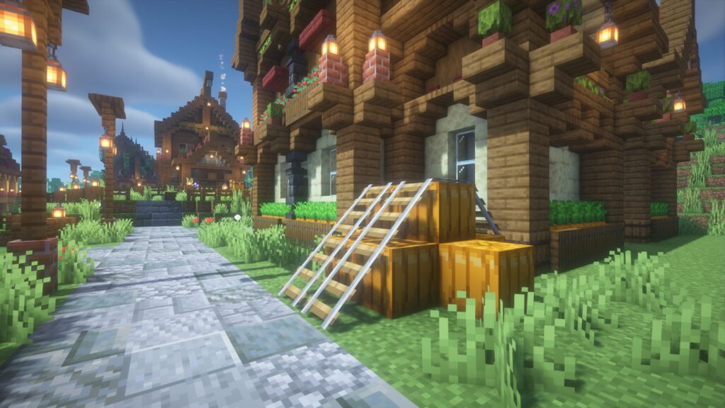 マインクラフトのカフェの脇の空きスペースに積み上げられたカボチャの装飾の画像。