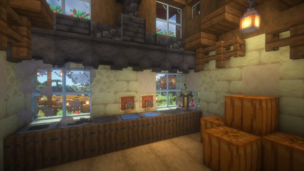 カフェのキッチン内部。大きな窓から外の景色が見え、上部には大釜と深層岩を組み合わせた重厚な排煙設備が設置されている。